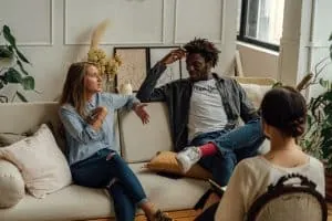Couple meeting with a marriage counselor in an office