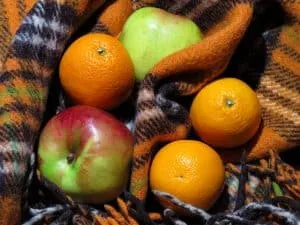 Apples and oranges arranged together