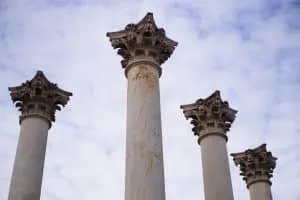 Stone columns against the sky, illustrating stability and support